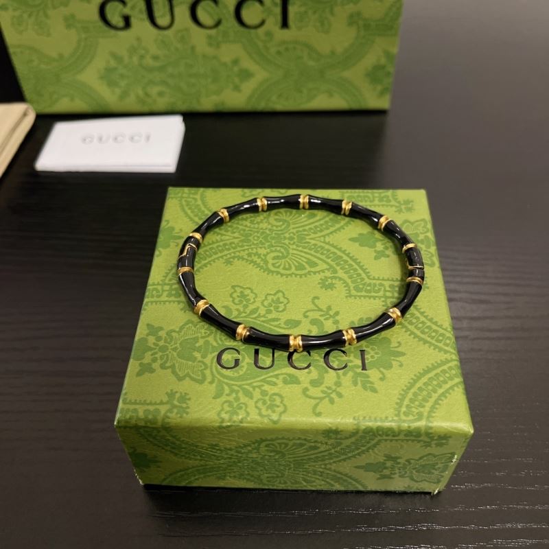 G*u*i bracelets